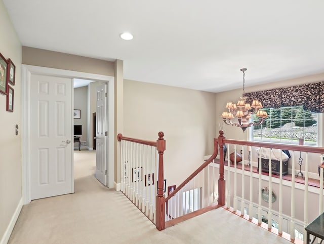 335 Sullivan Dr, Sayre, PA 18840 - hallway featuring an upstairs landing, a chandelier, carpet floors, recessed lighting, and baseboards