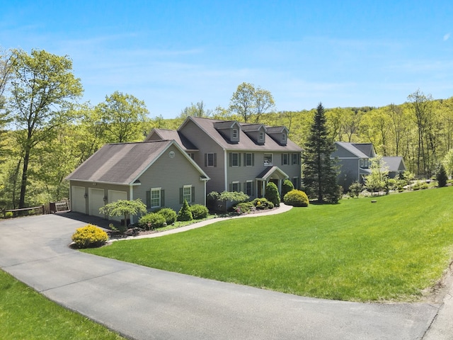 335 Sullivan Dr, Sayre, PA 18840 - colonial house with driveway, a front lawn, and an attached garage
