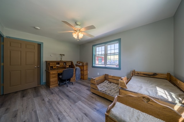 481 Case Rd, Sayre, PA 18840 - bedroom featuring wood finished floors, ceiling fan, and a desk