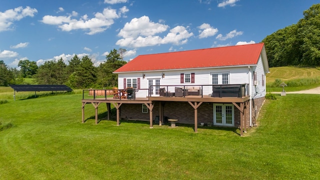 481 Case Rd, Sayre, PA 18840 - back of property with french doors, a wooden deck, and a lawn