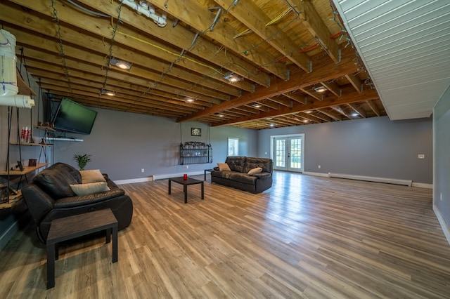 481 Case Rd, Sayre, PA 18840 - living room with a baseboard radiator and wood finished floors