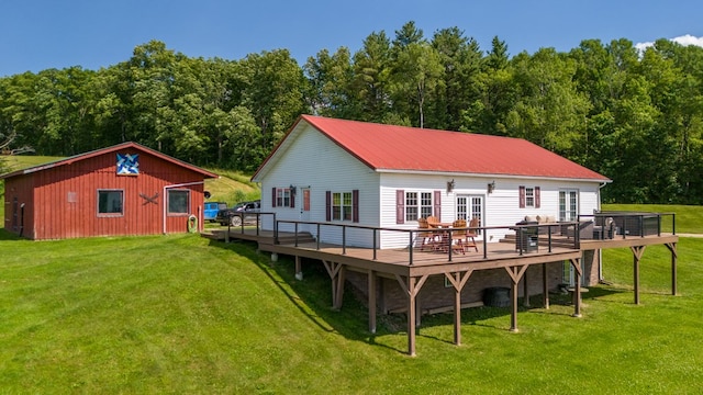 481 Case Rd, Sayre, PA 18840 - rear view of house with a deck and a lawn