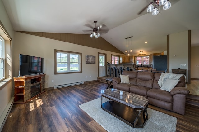 481 Case Rd, Sayre, PA 18840 - living room featuring ceiling fan, a baseboard heating unit, lofted ceiling, dark wood-style floors, and a glass covered fireplace