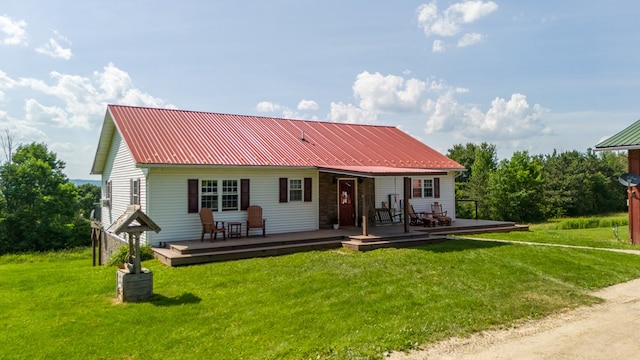 481 Case Rd, Sayre, PA 18840 - view of front facade with a front yard, a metal roof, and a deck