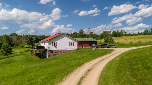 481 Case Rd, Sayre, PA 18840 - view of side of property with driveway, a yard, a deck, and a garage