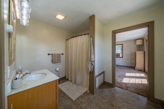 481 Case Rd, Sayre, PA 18840 - bathroom featuring vanity, curtained shower, and a baseboard heating unit
