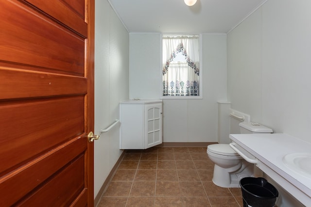 bathroom featuring tile patterned floors and toilet