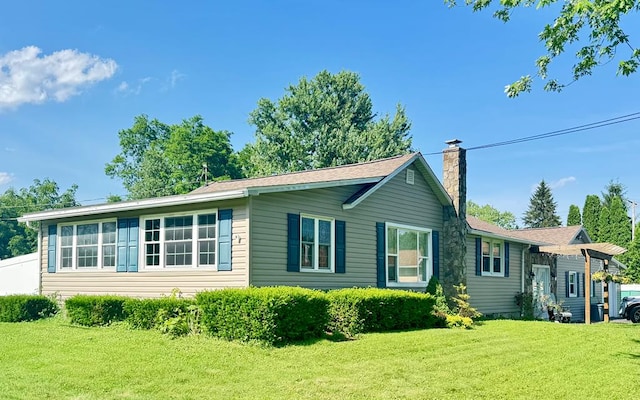106 Magnolia St, Athens, PA 18810 - view of side of home featuring a chimney and a lawn