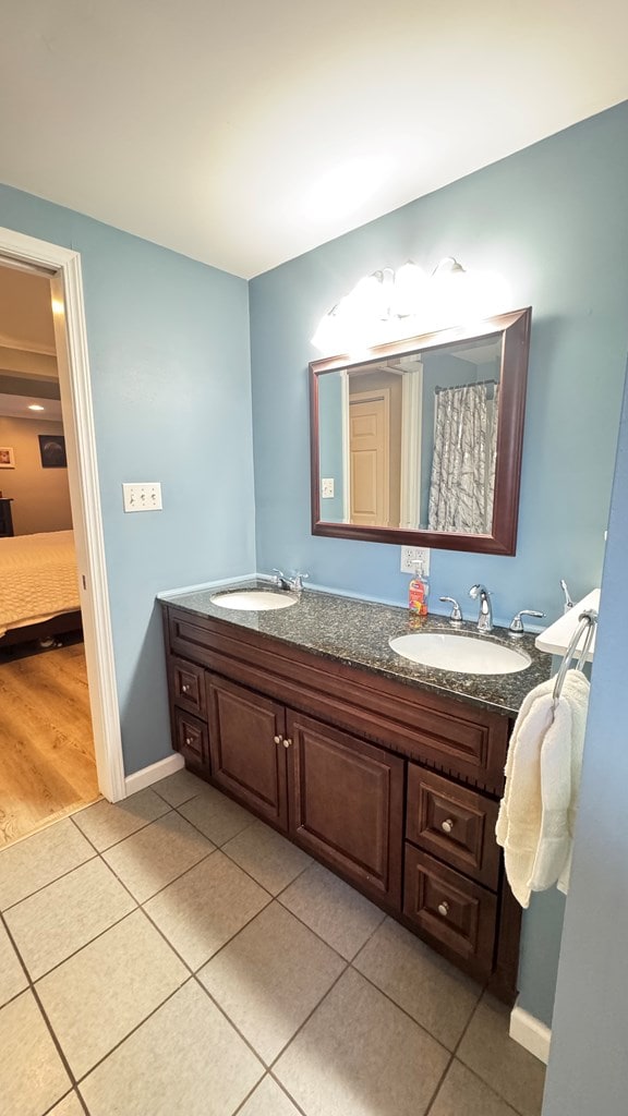106 Magnolia St, Athens, PA 18810 - bathroom featuring double vanity, tile patterned flooring, and ensuite bathroom