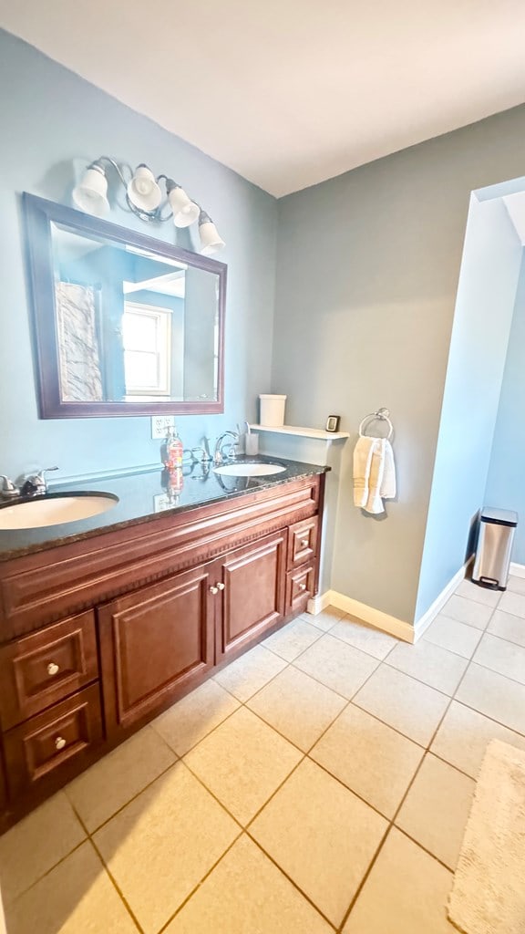 106 Magnolia St, Athens, PA 18810 - full bath with double vanity and tile patterned floors