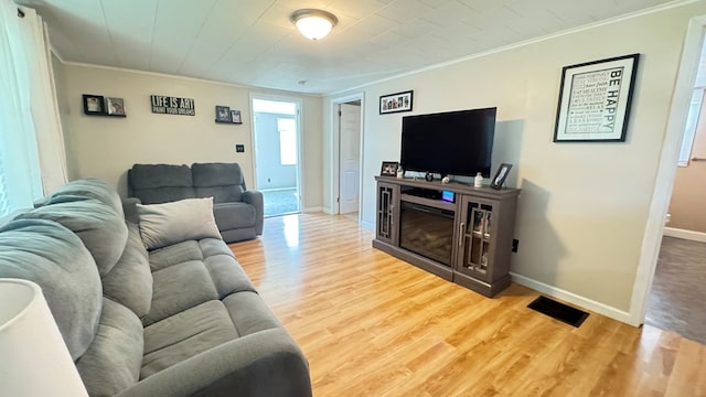 106 Magnolia St, Athens, PA 18810 - living room with ornamental molding and wood finished floors