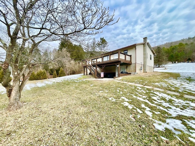 exterior space featuring a yard and a deck