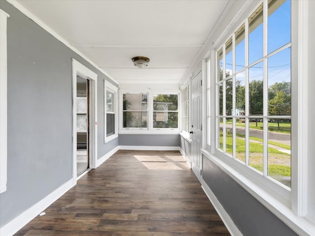 unfurnished sunroom with plenty of natural light