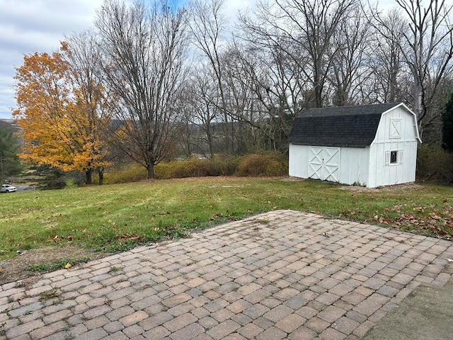 view of patio featuring a storage unit