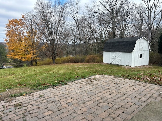 342 Smoke Rise Rd, Mansfield, PA 16933 - view of patio featuring an outdoor structure and a barn