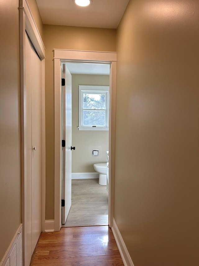 corridor featuring light wood-type flooring