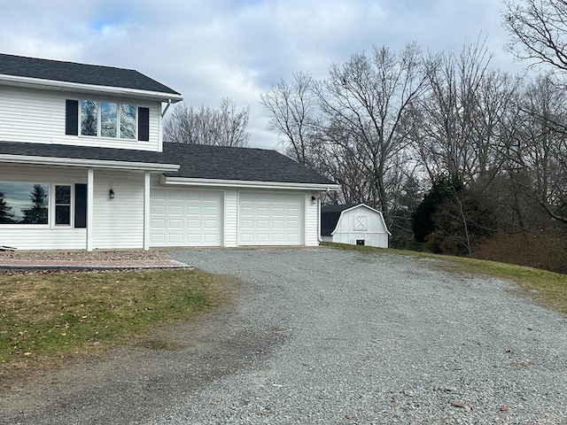 342 Smoke Rise Rd, Mansfield, PA 16933 - view of home's exterior featuring driveway, a shingled roof, and a garage