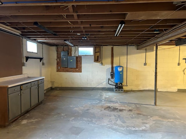 342 Smoke Rise Rd, Mansfield, PA 16933 - below grade area featuring a water pressure tank, electric panel, and plenty of natural light