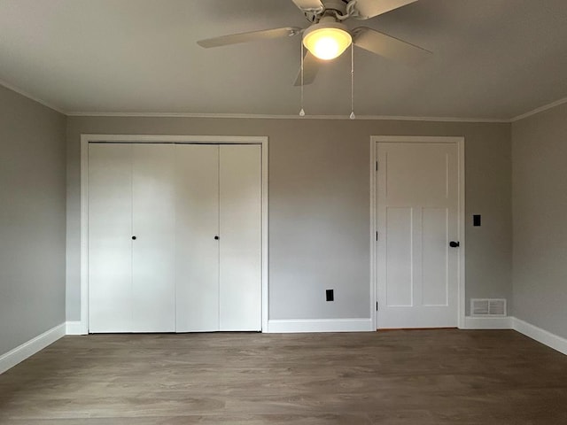 342 Smoke Rise Rd, Mansfield, PA 16933 - unfurnished bedroom featuring wood finished floors, ornamental molding, a closet, and a ceiling fan