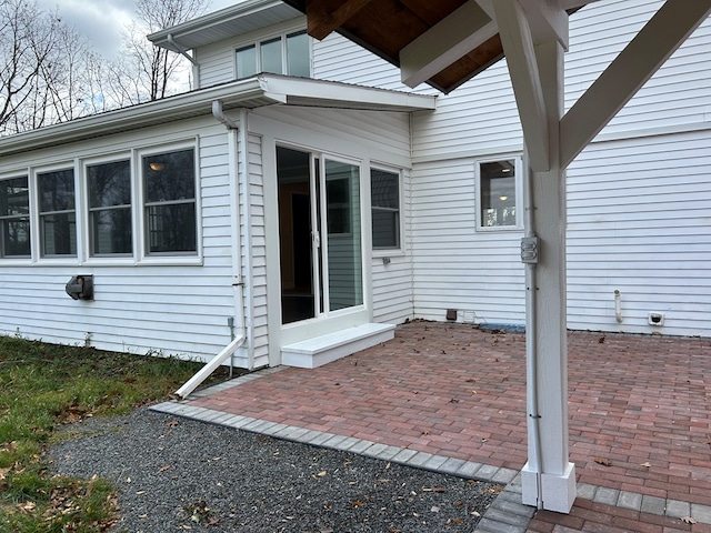 property entrance with a patio