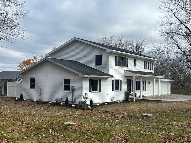 342 Smoke Rise Rd, Mansfield, PA 16933 - view of front of property with a garage, a porch, driveway, a front yard, and roof with shingles