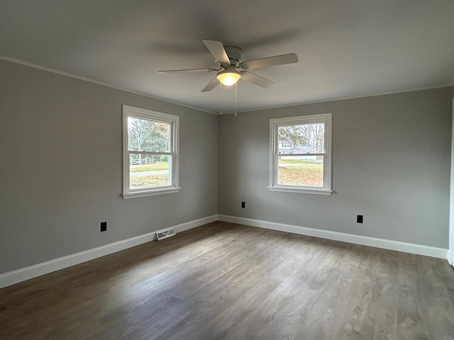 unfurnished room featuring crown molding, ceiling fan, and hardwood / wood-style flooring