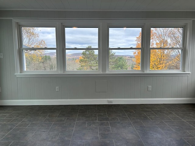 342 Smoke Rise Rd, Mansfield, PA 16933 - empty room featuring dark stone finish flooring, wood walls, and wood ceiling