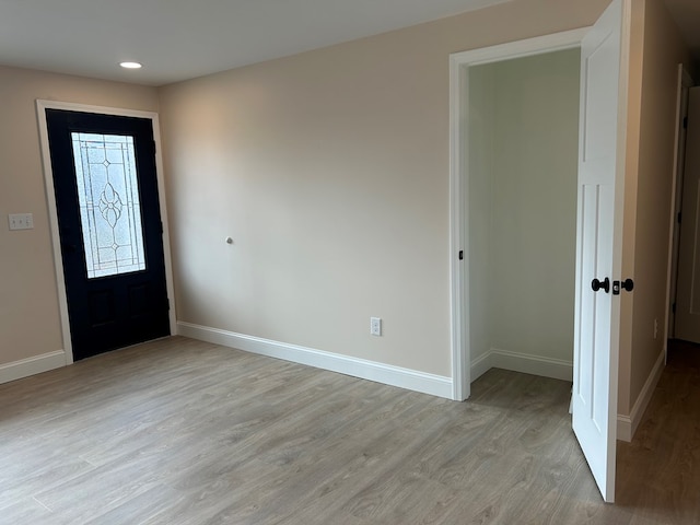 foyer entrance featuring light hardwood / wood-style flooring