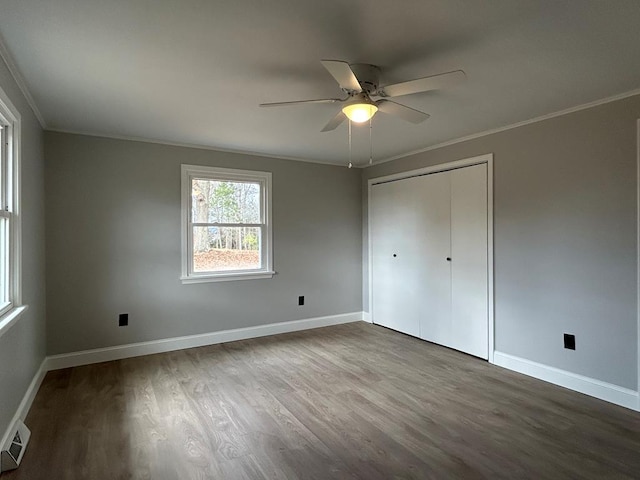 342 Smoke Rise Rd, Mansfield, PA 16933 - unfurnished bedroom featuring ornamental molding, wood finished floors, a closet, and a ceiling fan