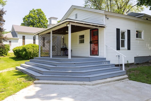 213 Holden St, Osceola, PA 16942 - view of front of house with covered porch and a front lawn