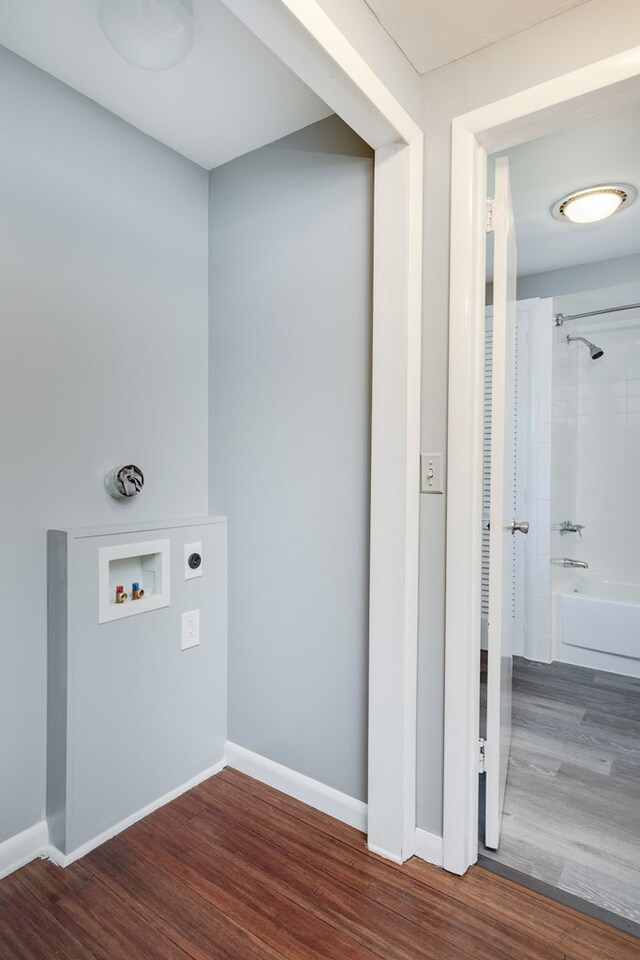 213 Holden St, Osceola, PA 16942 - laundry area with hookup for a washing machine, electric dryer hookup, wood finished floors, and baseboards