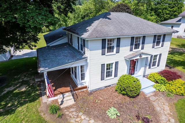 213 Holden St, Osceola, PA 16942 - colonial-style house featuring roof with shingles and a front yard
