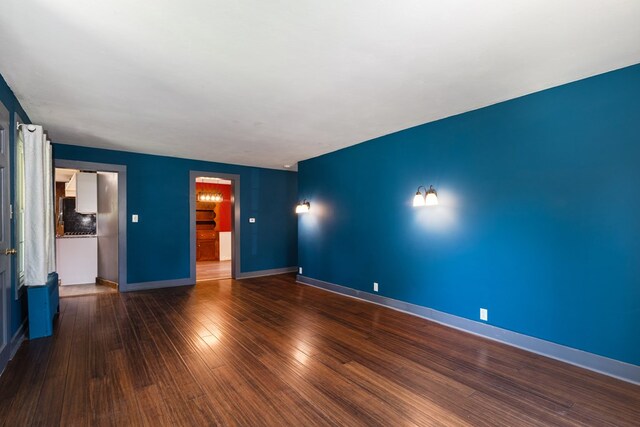 213 Holden St, Osceola, PA 16942 - unfurnished bedroom featuring wood finished floors and baseboards