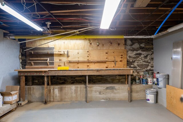 213 Holden St, Osceola, PA 16942 - unfinished below grade area featuring a workshop area