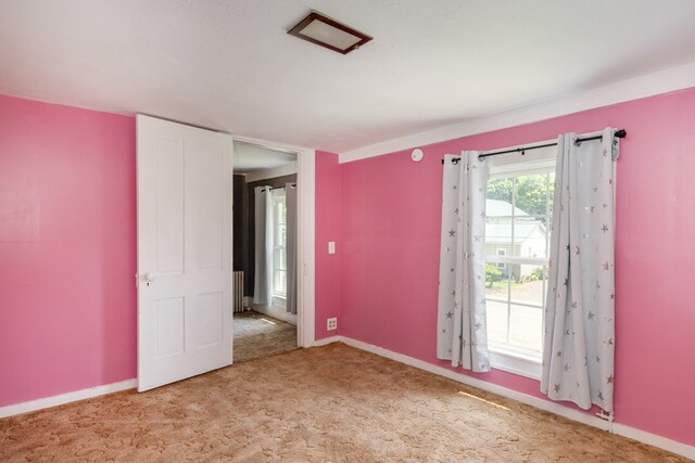 213 Holden St, Osceola, PA 16942 - unfurnished bedroom with radiator, carpet flooring, and baseboards