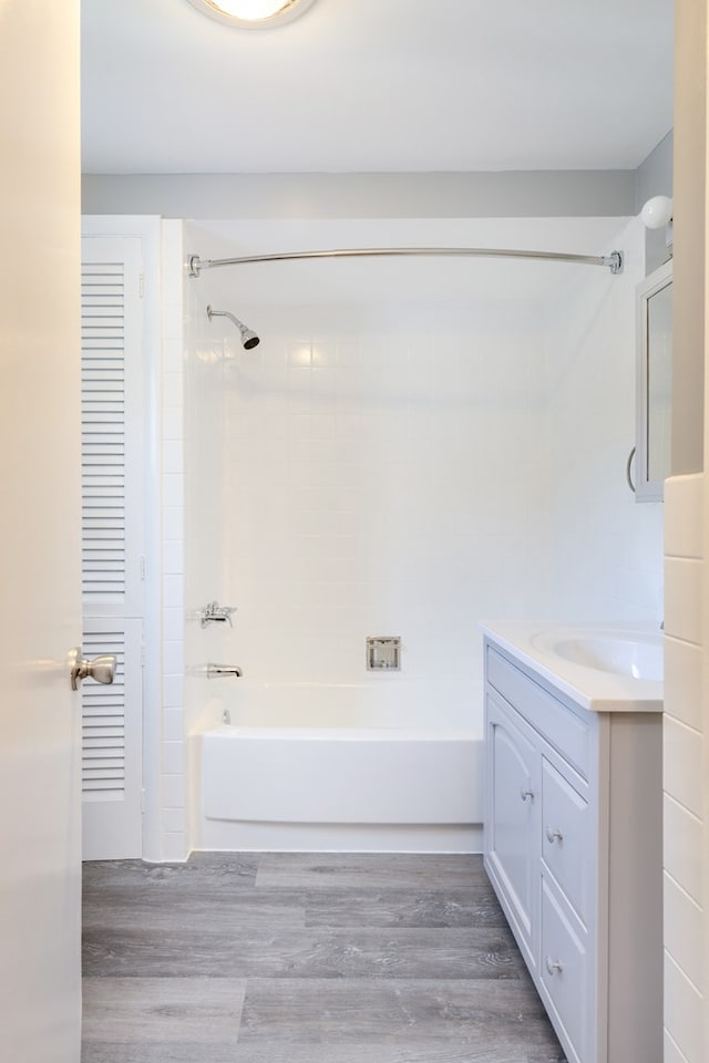213 Holden St, Osceola, PA 16942 - full bathroom with vanity, wood finished floors, and shower / bath combination