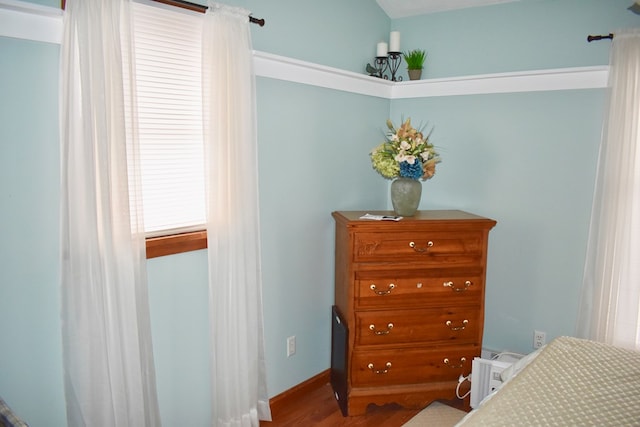 bedroom featuring hardwood / wood-style floors