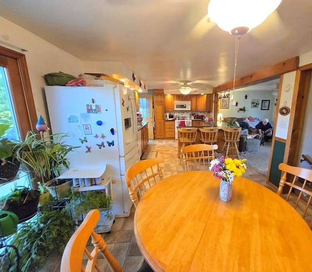 16 Evergreen Dr, Tunkhannock, PA 12155 - dining space featuring a ceiling fan and plenty of natural light