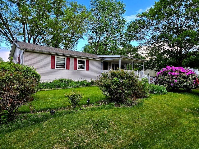 16 Evergreen Dr, Tunkhannock, PA 12155 - view of front facade with a front yard
