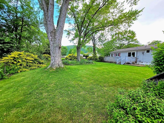 16 Evergreen Dr, Tunkhannock, PA 12155 - view of grassy yard with a wooden deck