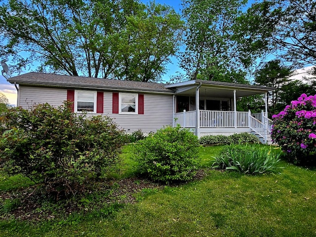 16 Evergreen Dr, Tunkhannock, PA 12155 - view of front of property with a front yard and a porch