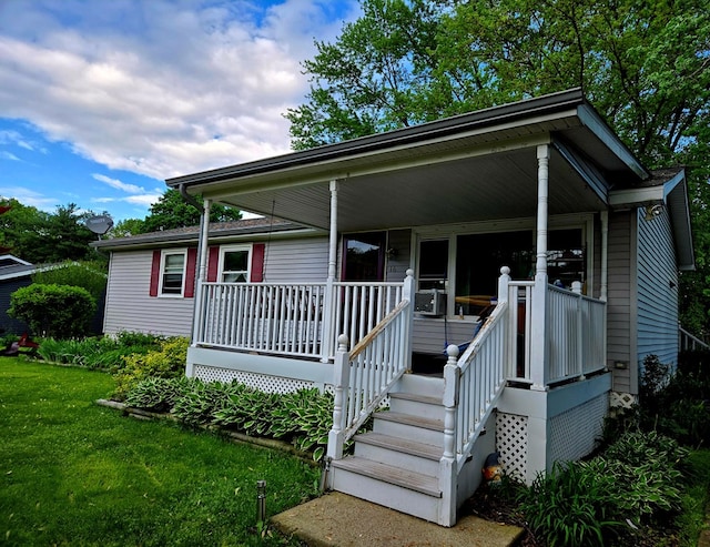 16 Evergreen Dr, Tunkhannock, PA 12155 - view of front of home with a porch and a front yard