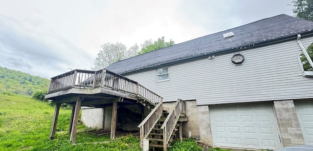 8380 Sheshequin Rd, Athens, PA 18810 - back of house featuring a deck, a garage, stairway, and roof with shingles