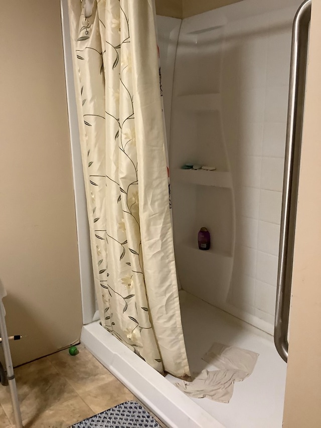 bathroom with curtained shower