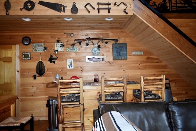 interior space featuring wooden walls and wood ceiling