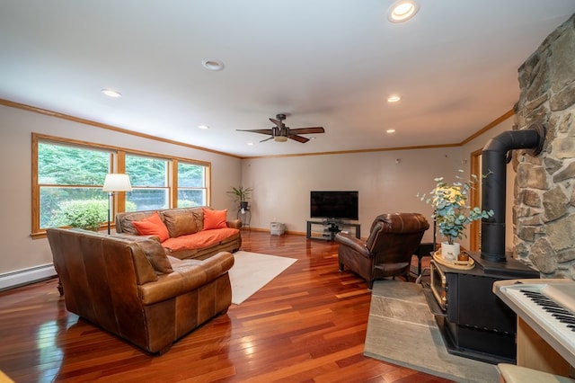 105 Laurel Ln, Sayre, PA 18840 - living room featuring a wood stove, crown molding, ceiling fan, hardwood / wood-style floors, and recessed lighting
