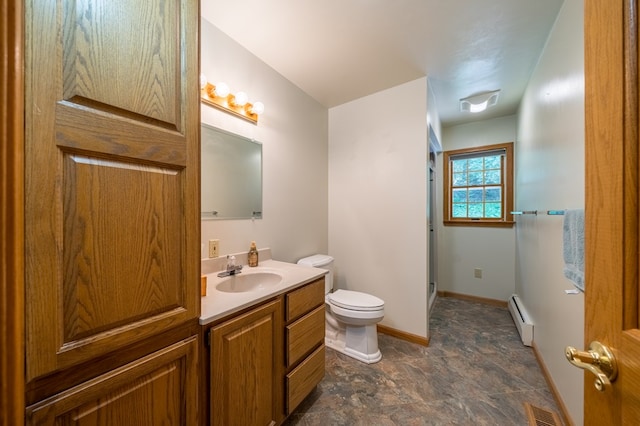 105 Laurel Ln, Sayre, PA 18840 - bathroom with a baseboard heating unit, toilet, vanity, a shower with shower door, and baseboards