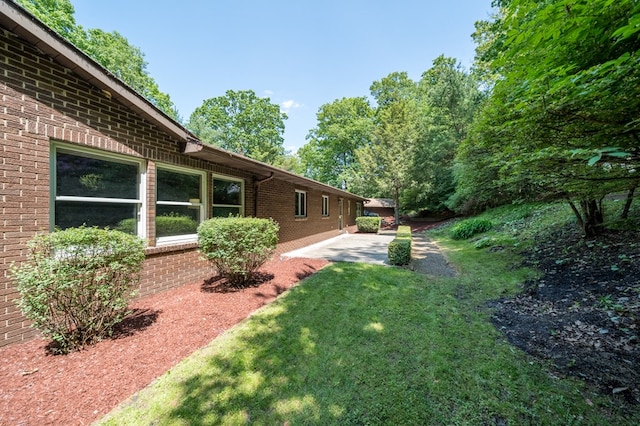 105 Laurel Ln, Sayre, PA 18840 - view of grassy yard featuring a patio area