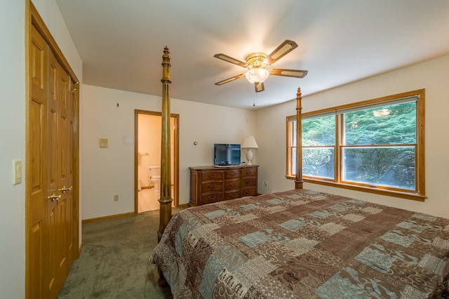 105 Laurel Ln, Sayre, PA 18840 - carpeted bedroom with ensuite bath, baseboards, and a ceiling fan