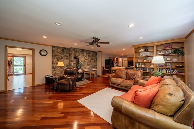105 Laurel Ln, Sayre, PA 18840 - living room with ornamental molding, a wood stove, recessed lighting, a ceiling fan, and wood finished floors